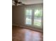 Bedroom with large windows and hardwood flooring, providing ample natural light at 4050 Rollingwood Cir, Rock Hill, SC 29732