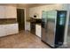Spacious kitchen with stainless steel appliances, granite counters, and tile flooring at 4050 Rollingwood Cir, Rock Hill, SC 29732