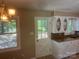 Bright kitchen featuring granite counters, white cabinets, and plenty of natural light at 4050 Rollingwood Cir, Rock Hill, SC 29732