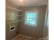 Laundry room featuring wire shelving, a window, and neutral paint at 4050 Rollingwood Cir, Rock Hill, SC 29732