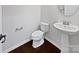 A powder room features a pedestal sink with updated faucet fixtures at 5013 Crandon Rd, Fort Mill, SC 29707