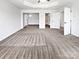 The spacious main bedroom offers neutral colors and soft carpeting throughout at 5013 Crandon Rd, Fort Mill, SC 29707