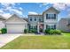 Charming two-story home with well-manicured lawn and inviting curb appeal in a desirable neighborhood at 5079 Nighthawk Dr, Fort Mill, SC 29707