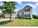Inviting two-story home features a lush front yard, well maintained lawn, and classic architectural details at 5079 Nighthawk Dr, Fort Mill, SC 29707