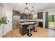 Modern kitchen featuring stainless steel appliances, granite countertops, and stylish cabinetry at 5079 Nighthawk Dr, Fort Mill, SC 29707