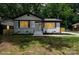 Charming bungalow with fresh exterior paint, updated landscaping, new exterior lighting, and updated shutters at 5420 Gwynne Ave # 21, Charlotte, NC 28205