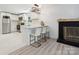 Open kitchen with white breakfast bar and modern lighting flowing into an open living space at 5420 Gwynne Ave # 21, Charlotte, NC 28205