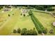 A bird's-eye view showcases this property's location, surrounded by greenery, expansive lots, and clear blue skies at 594 Patterson Farm Rd, Mooresville, NC 28115