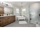 Elegant bathroom boasts a clawfoot tub, subway tile, and stylish fixtures for a luxurious feel at 594 Patterson Farm Rd, Mooresville, NC 28115