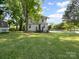 Two-story home featuring lush, green lawn at 616 W Marion St, Shelby, NC 28150