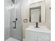 This bathroom has a glass enclosed shower, modern vanity, and sleek fixtures at 616 W Marion St, Shelby, NC 28150