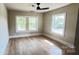 Empty bedroom featuring natural light, wood floors, and neutral walls at 616 W Marion St, Shelby, NC 28150
