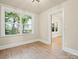 Bright bedroom with hardwood floors and a large window at 616 W Marion St, Shelby, NC 28150