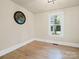 Cozy bedroom with hardwood floors and a bright window view at 616 W Marion St, Shelby, NC 28150