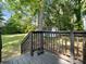 Home exterior featuring dark stained deck, and backyard at 616 W Marion St, Shelby, NC 28150