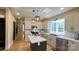 Beautiful modern kitchen with a center island, stainless steel appliances, and bright natural light at 616 W Marion St, Shelby, NC 28150