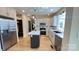 This stunning kitchen features stainless steel appliances, custom cabinets, and a center island at 616 W Marion St, Shelby, NC 28150