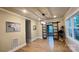 Open-concept living area with a view of a sliding barn door and modern lighting at 616 W Marion St, Shelby, NC 28150