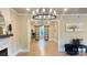 This open-concept living room features a fireplace and plenty of natural light at 616 W Marion St, Shelby, NC 28150