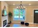 Cozy living room boasts a fireplace and large windows providing ample natural light at 616 W Marion St, Shelby, NC 28150
