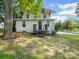 Two-story home featuring stairs that leading up to back entry at 616 W Marion St, Shelby, NC 28150