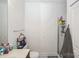 Bright bathroom with a modern shower, a white vanity, and tiled floors at 630 Calvert St # 410, Charlotte, NC 28208