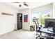 Relaxing bedroom featuring a desk, neutral colors, a ceiling fan, and a window with a neighborhood view at 6507 Revolutionary Trl, Charlotte, NC 28217