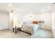 Spacious carpeted bedroom with ample natural light, walk-in closet, and neutral decor at 6507 Revolutionary Trl, Charlotte, NC 28217