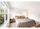 Inviting bedroom with large windows, natural light, and updated furnishings at 6507 Revolutionary Trl, Charlotte, NC 28217