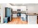 Modern kitchen featuring stainless steel appliances, granite countertops, and ample cabinet space at 6507 Revolutionary Trl, Charlotte, NC 28217