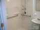Bathroom showcasing accessible features, including a walk-in shower and grab bars at 761 Henry Rhodes Rd, Lincolnton, NC 28092