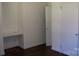 Bedroom featuring built-in desk and closet, with neutral paint and hardwood floors at 761 Henry Rhodes Rd, Lincolnton, NC 28092