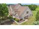 Overhead view showcases this townhome's mature landscaping, brick facade, and inviting curb appeal at 825 Rock Lake Gln, Fort Mill, SC 29715