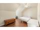 Bedroom with hardwood floors, neutral walls, and a view of the backyard at 825 Rock Lake Gln, Fort Mill, SC 29715