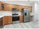 Modern kitchen with stainless steel appliances, ample storage, and a functional layout for cooking at 8465 Olde Troon Dr, Charlotte, NC 28277