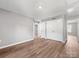 Bright and airy bedroom with wood floors and plenty of room to customize at 9136 Creedmore Hills Dr, Charlotte, NC 28214