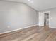 This bedroom offers neutral walls, and attractive flooring, providing a blank canvas for personalization at 9136 Creedmore Hills Dr, Charlotte, NC 28214