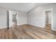 This bedroom features neutral walls and attractive flooring, offering a versatile space at 9136 Creedmore Hills Dr, Charlotte, NC 28214