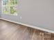 Bedroom features a large window, providing ample natural light at 9136 Creedmore Hills Dr, Charlotte, NC 28214