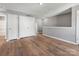 Spacious bonus room features wood floors, closets, and neutral paint for versatile use at 9136 Creedmore Hills Dr, Charlotte, NC 28214
