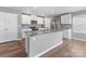 Well-equipped kitchen with an island, granite countertops, and stainless appliances at 9136 Creedmore Hills Dr, Charlotte, NC 28214