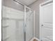 The bathroom includes an enclosed shower unit with a neutral color scheme at 9136 Creedmore Hills Dr, Charlotte, NC 28214