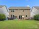 Expansive backyard with patio, perfect for outdoor activities and entertaining friends and Gathering at 1008 Whipcord Dr, Waxhaw, NC 28173