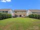 View of a large backyard and patio at 1008 Whipcord Dr, Waxhaw, NC 28173