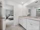 Bathroom boasts double sinks and an entry to the main bedroom at 1008 Whipcord Dr, Waxhaw, NC 28173