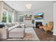 Comfortable living room with fireplace, neutral decor, and ample natural light at 1008 Whipcord Dr, Waxhaw, NC 28173