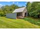 Rustic barn with a metal roof and a side storage shed at 1043 Linneys Mill Rd, Union Grove, NC 28689