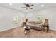 Comfortable living room featuring wood flooring, neutral decor, and lots of sunlight at 1043 Linneys Mill Rd, Union Grove, NC 28689