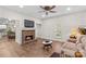 Bright living room with brick fireplace, wood flooring and lots of natural light at 1043 Linneys Mill Rd, Union Grove, NC 28689