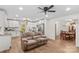 Bright, open-concept living space with an adjoining modern kitchen and dining area at 1043 Linneys Mill Rd, Union Grove, NC 28689